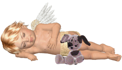 Русский мальчик ангелочек спит с мишкой у ног